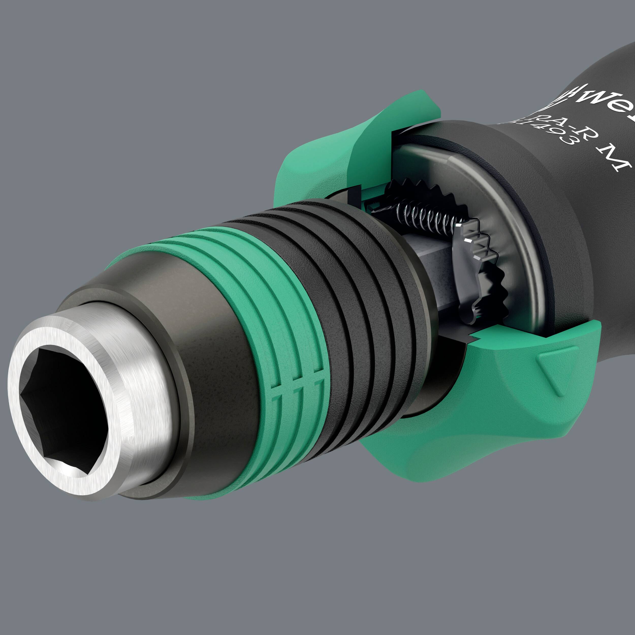 A socket extension with a green plastic handle and a metal head, revealing the internal threading, used for maintenance or repair.