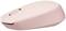 A pink computer mouse with a geometric pattern on its side, resting on a smooth surface.