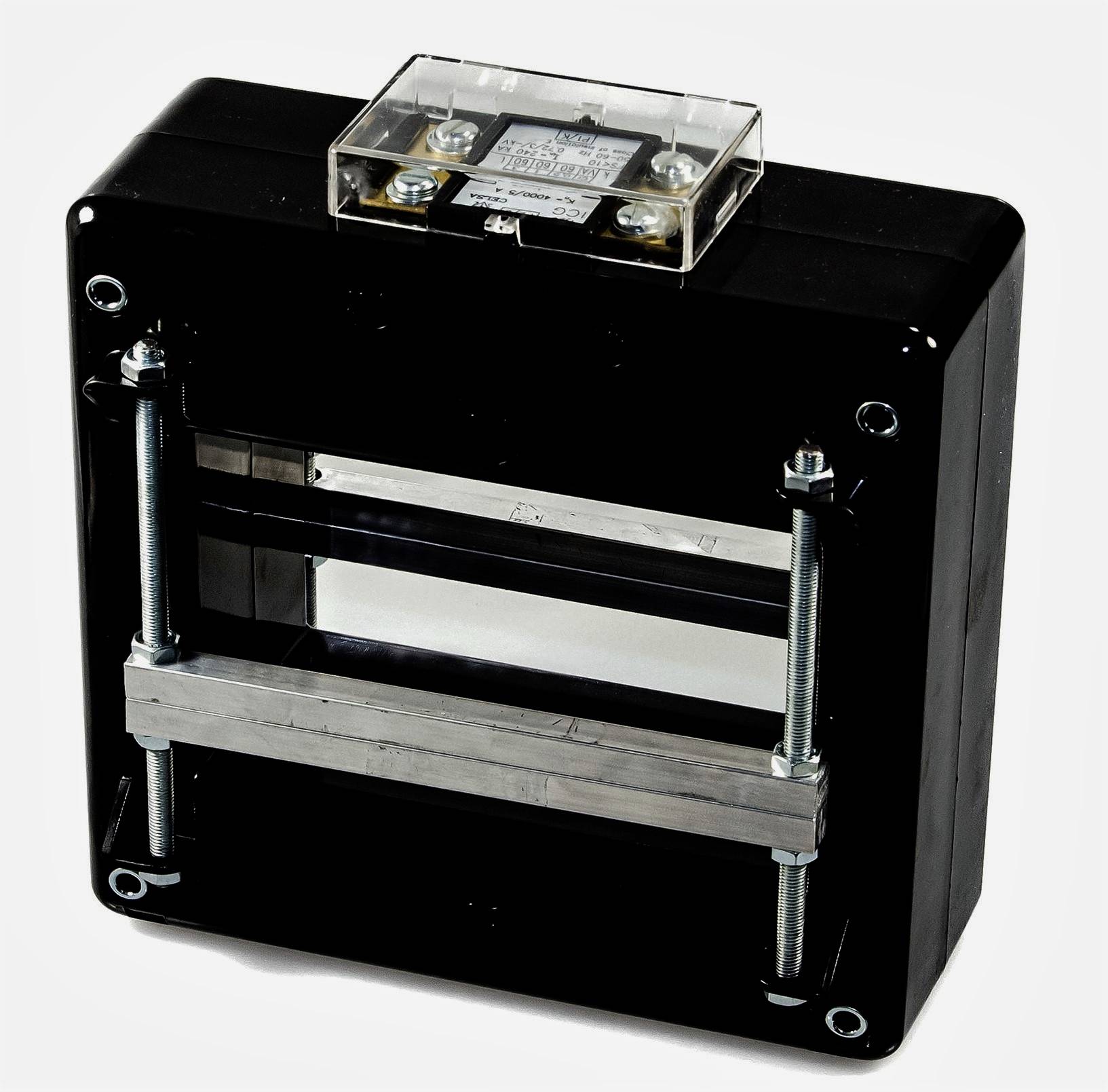 A rectangular electrical current transformer in a black housing with terminals and a transparent cover, set against a white background.