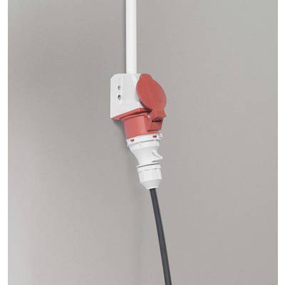 A red and white socket with a power cable plugged in against a grey wall.