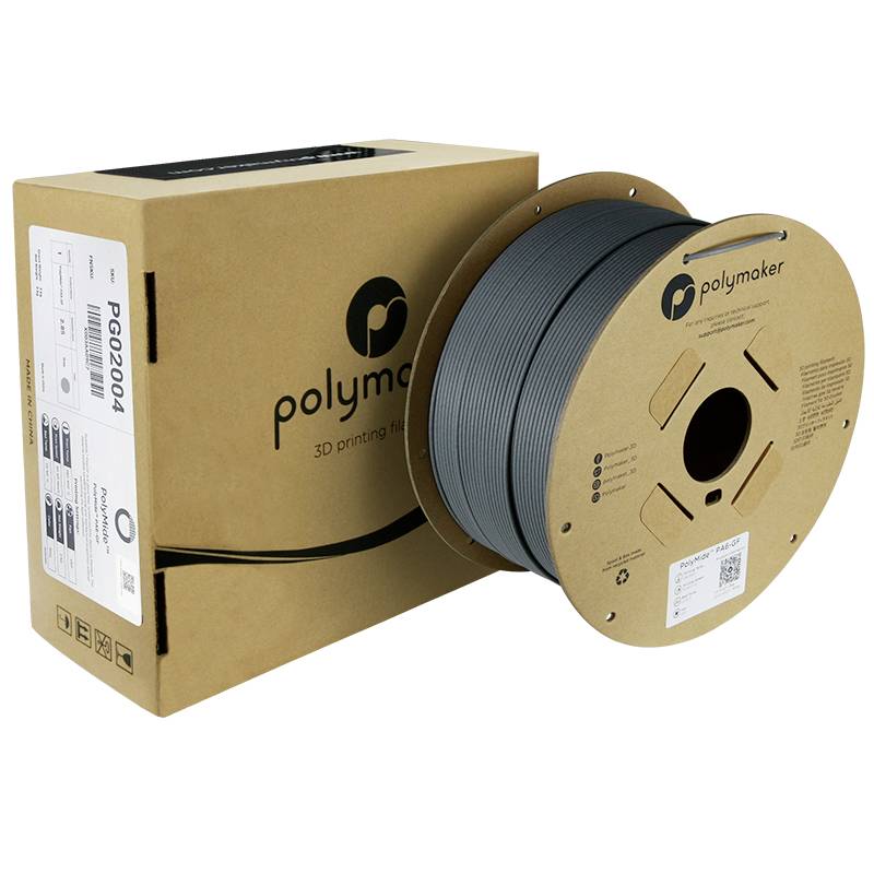 A roll of grey Polymaker 3D printer filament next to its matching cardboard packaging.