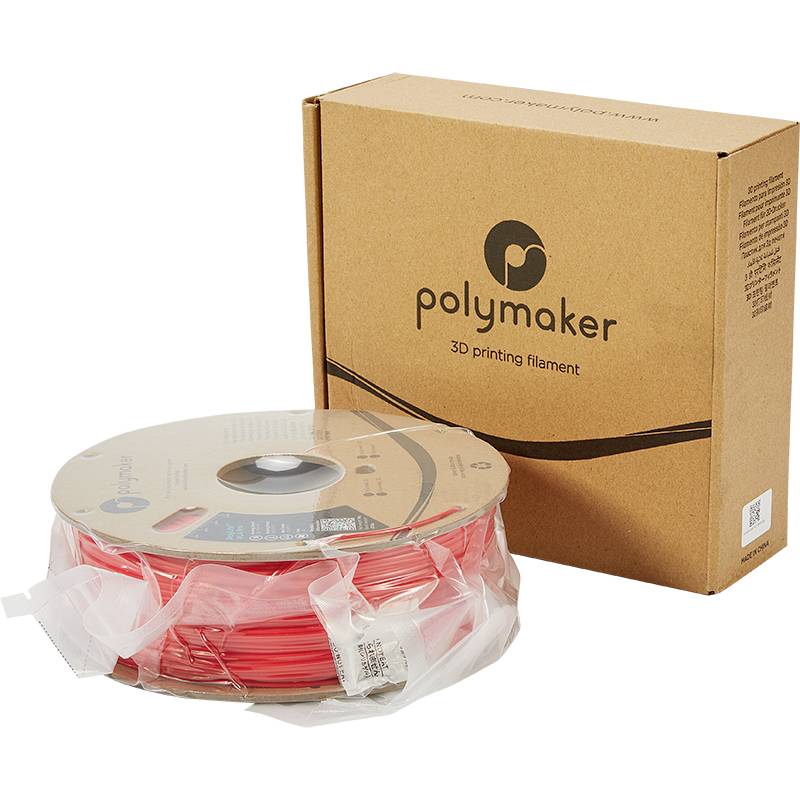 Roll of red 3D printer filament beside a brown cardboard packaging with the inscription 'Polymaker 3D printing filament'.