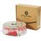 Roll of red 3D printer filament beside a brown cardboard packaging with the inscription 'Polymaker 3D printing filament'.