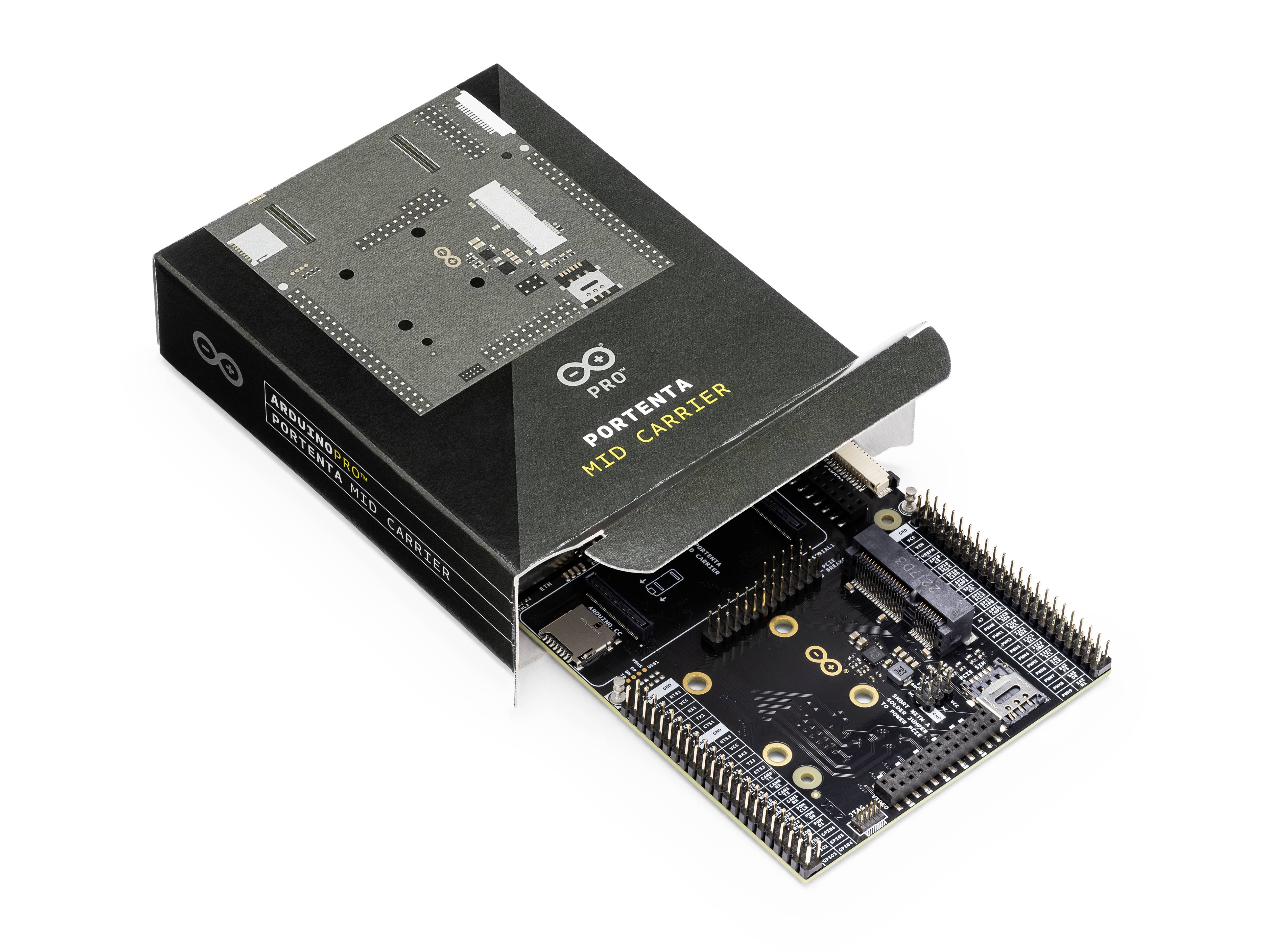 Arduino Pro Portenta H7 and carrier board in an opened black packaging. Electronic components and connections are visible.