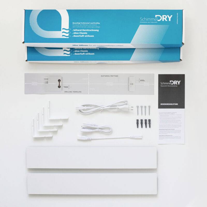 'Infrared Core Drying' Set consisting of two long, blue cardboard boxes, white heating element strips, cables, holders and screws.