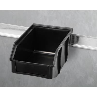 A black plastic container hangs from a metal rail on the wall. The container is empty and has an open side.