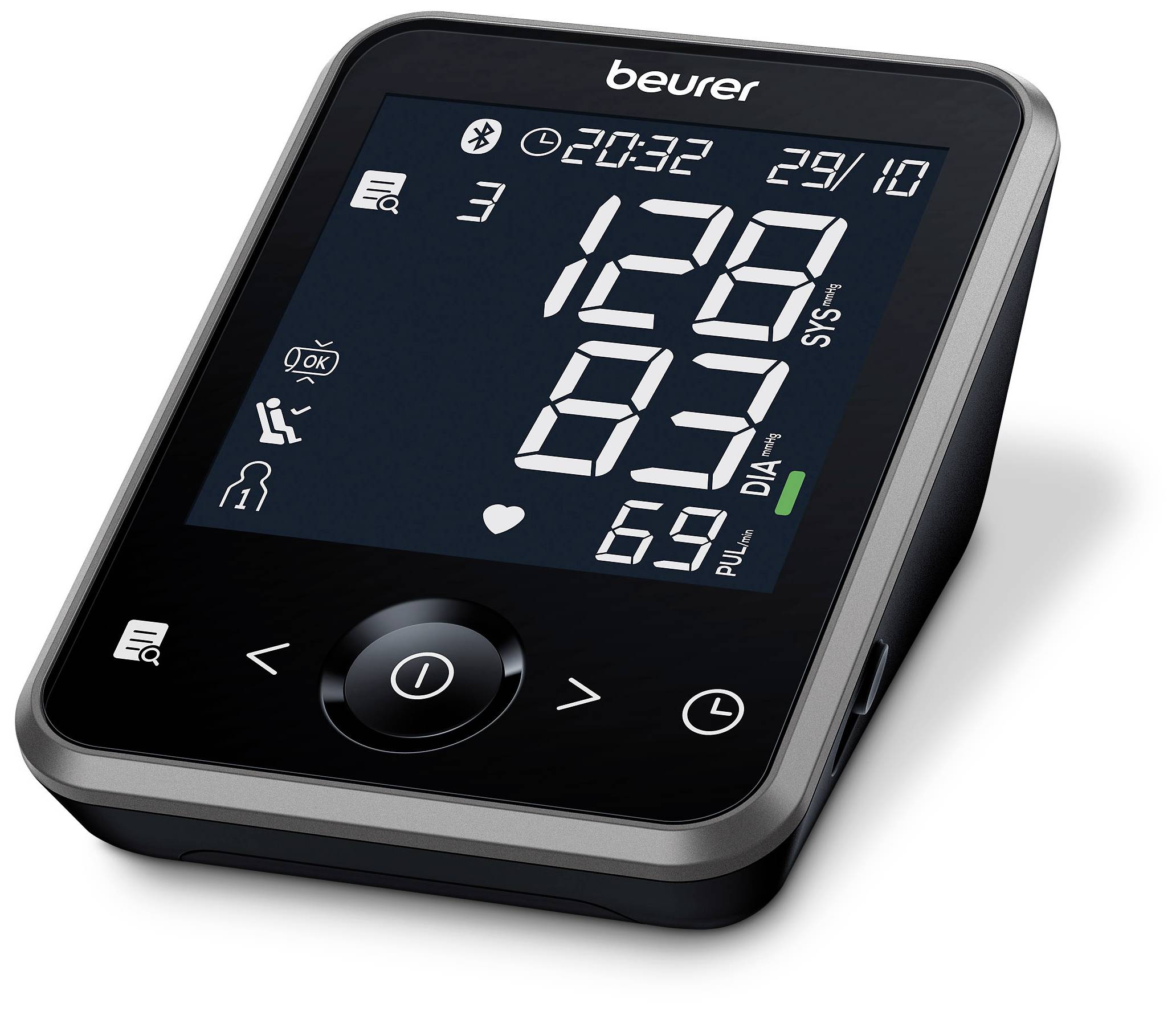 Electronic blood pressure monitor displays readings: 129 mmHg systolic, 83 mmHg diastolic, 69 pulse. Screen with time and date.