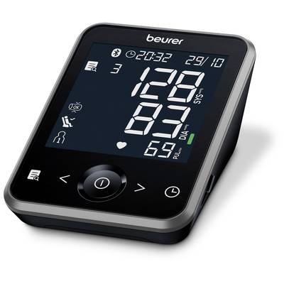 Electronic blood pressure monitor displays readings: 129 mmHg systolic, 83 mmHg diastolic, 69 pulse. Screen with time and date.