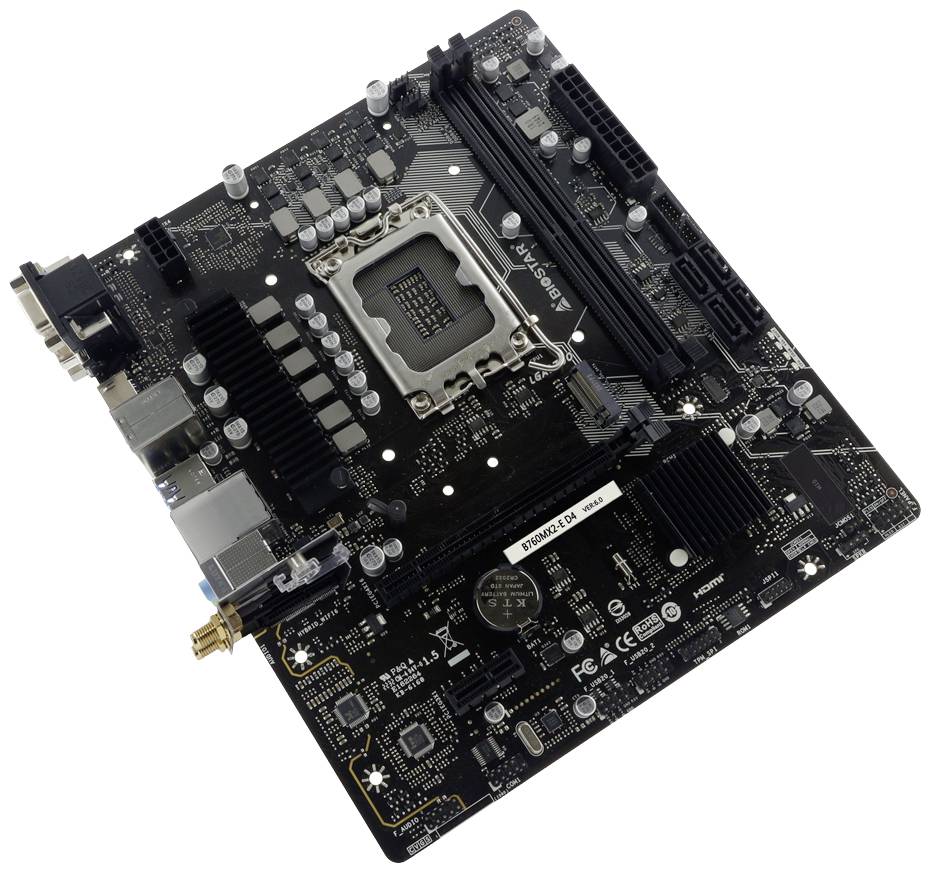 Black computer motherboard with various ports, slots and a CPU socket, on a white background.