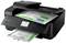 A multifunction printer prints coloured business documents with diagrams and tables.