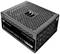 Black computer power supply 'Thermaltake Toughpower TF1 1550W' with multiple connection points and ventilation slots.