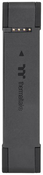 A black electronic device with a brand logo, positioned vertically. Small golden contacts are visible at the top.