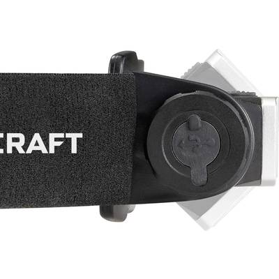 An adjustable strap with hook and loop fastening and a plastic rotary knob on a device or tool. Part of a printed logo is visible on the left side.