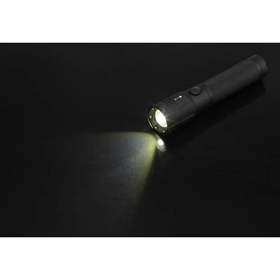 Black torch illuminates on black background, light beam pointing to the left.
