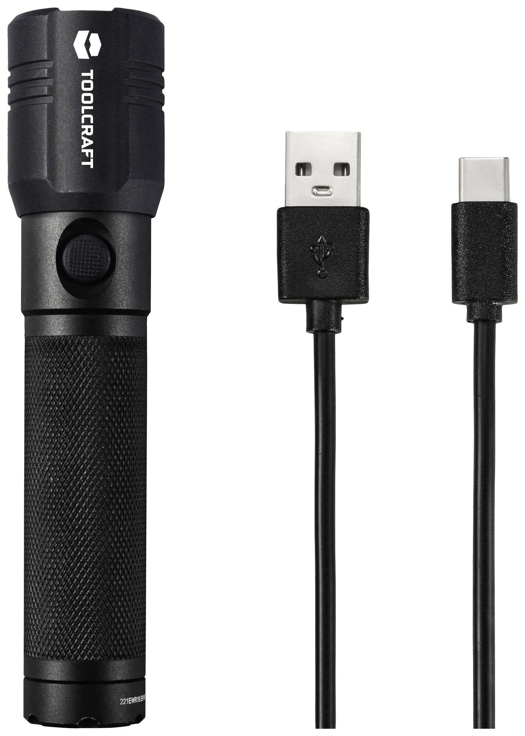 A black torch next to a USB-C charging cable.