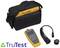A black bag with the inscription 'Fluke', a yellow electronic measuring device and another device with a cable. 'TruTest' logo visible.