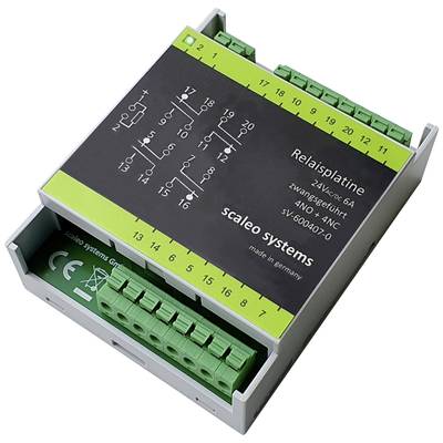 'Grey and green relay circuit board with terminal blocks and labelling. Used for controlling electrical devices, manufactured in Germany.'