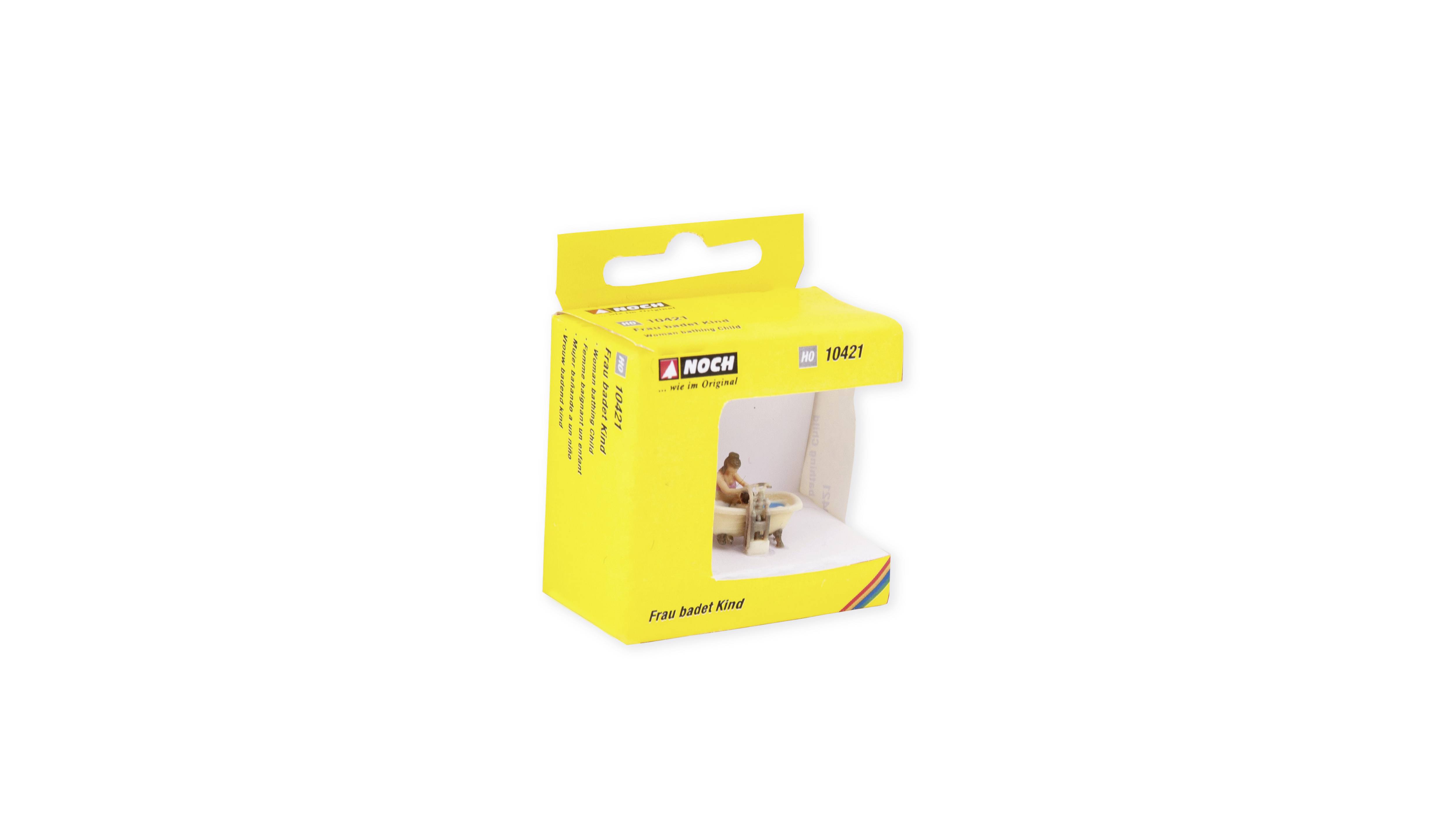 Yellow packaging with a viewing window. Contains a miniature figure of a seated man at a beer table. Brand 'NOCH'.