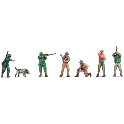Six miniature figures depict hunters; one is holding a rifle, another is kneeling with a map, a dog is running. They are wearing hunting attire.