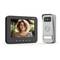 Video doorbell with monitor shows a woman smiling. Monitor on the left, camera with microphone and speaker on the right.