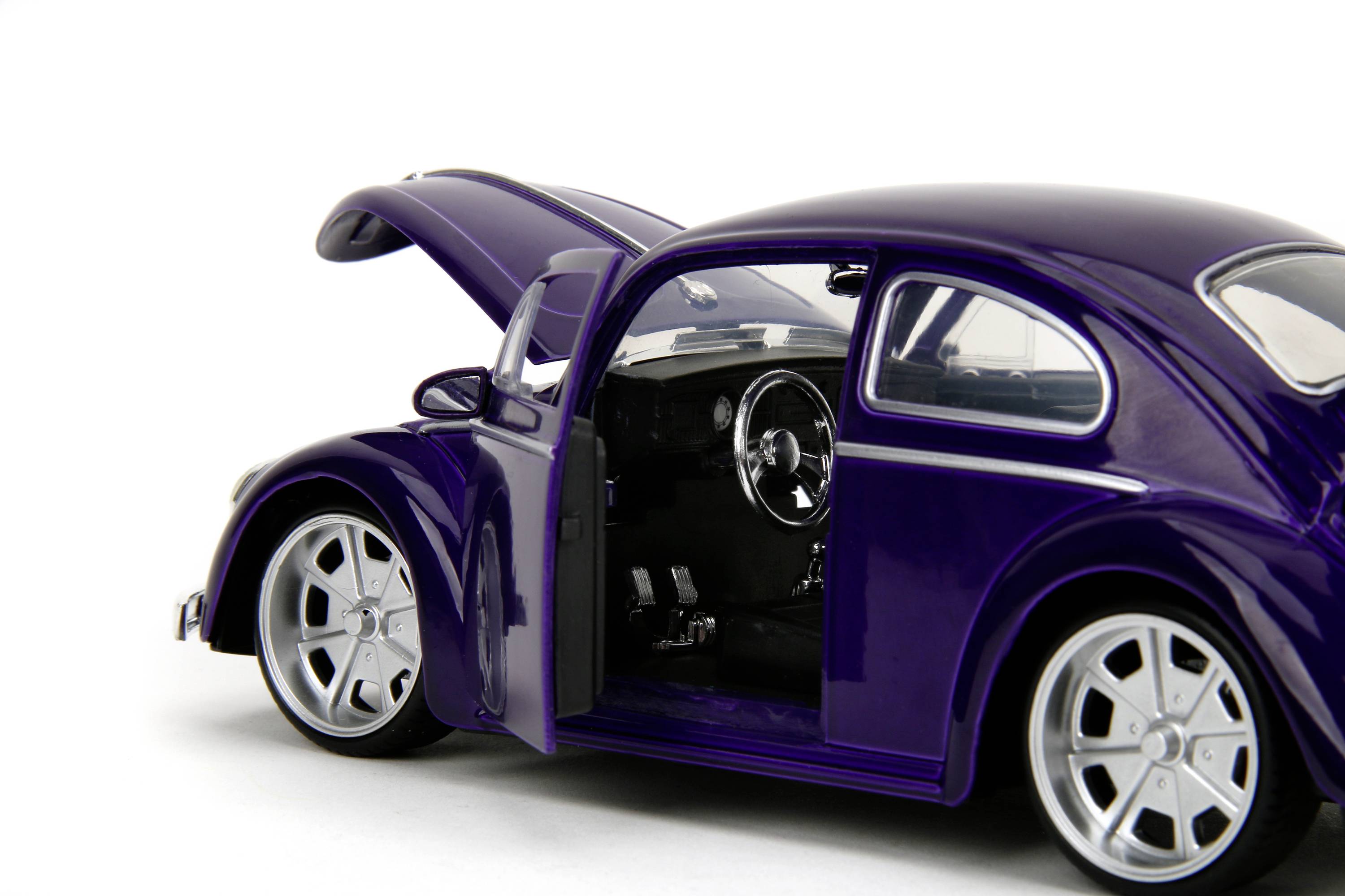 A purple toy car with open doors and boot against a white background.