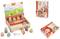 A wooden toy set with fairy tale motifs, including figurines, a USB cable, and a colourful box. The main figure is a child in red.