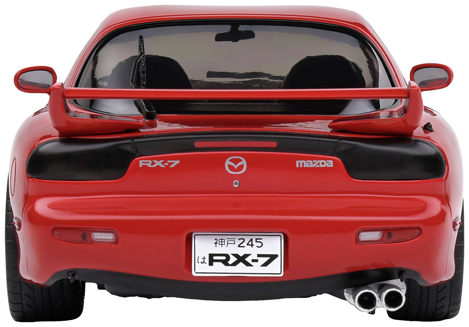 A red car with a spoiler from the rear, model 'RX-7' with a 'Mazda' badge, displaying a number plate with Japanese characters.