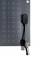 A solar module with a visible connector and connection cable for energy transmission.