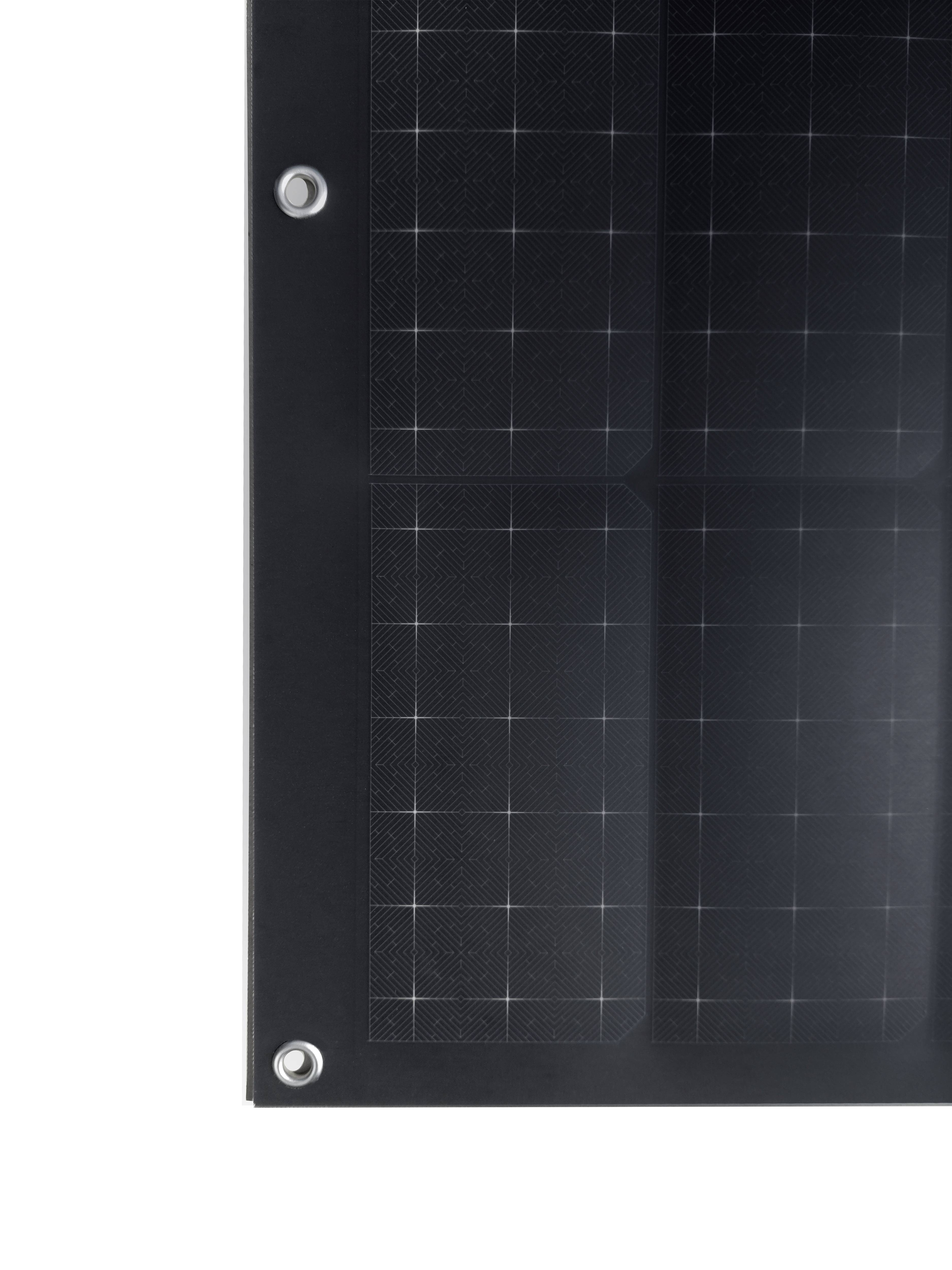 A section of a solar panel module, showing a black square cell structure, is visible.