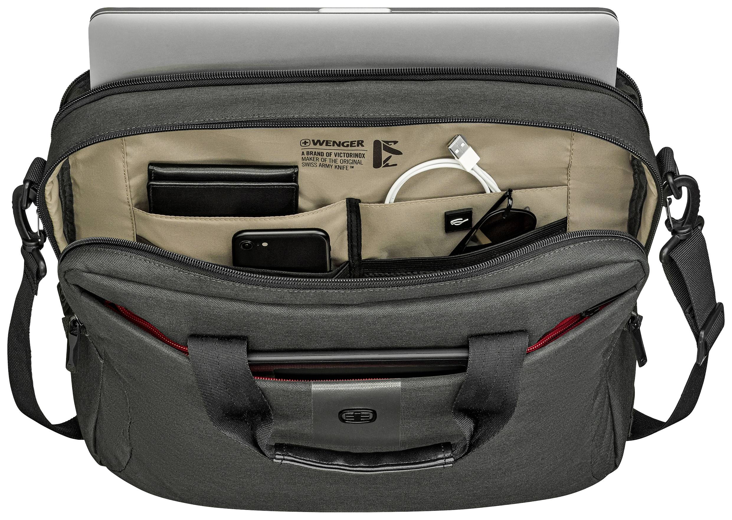 An open black briefcase with multiple compartments. Inside are a laptop, a charger, a mobile phone, and a pair of glasses.