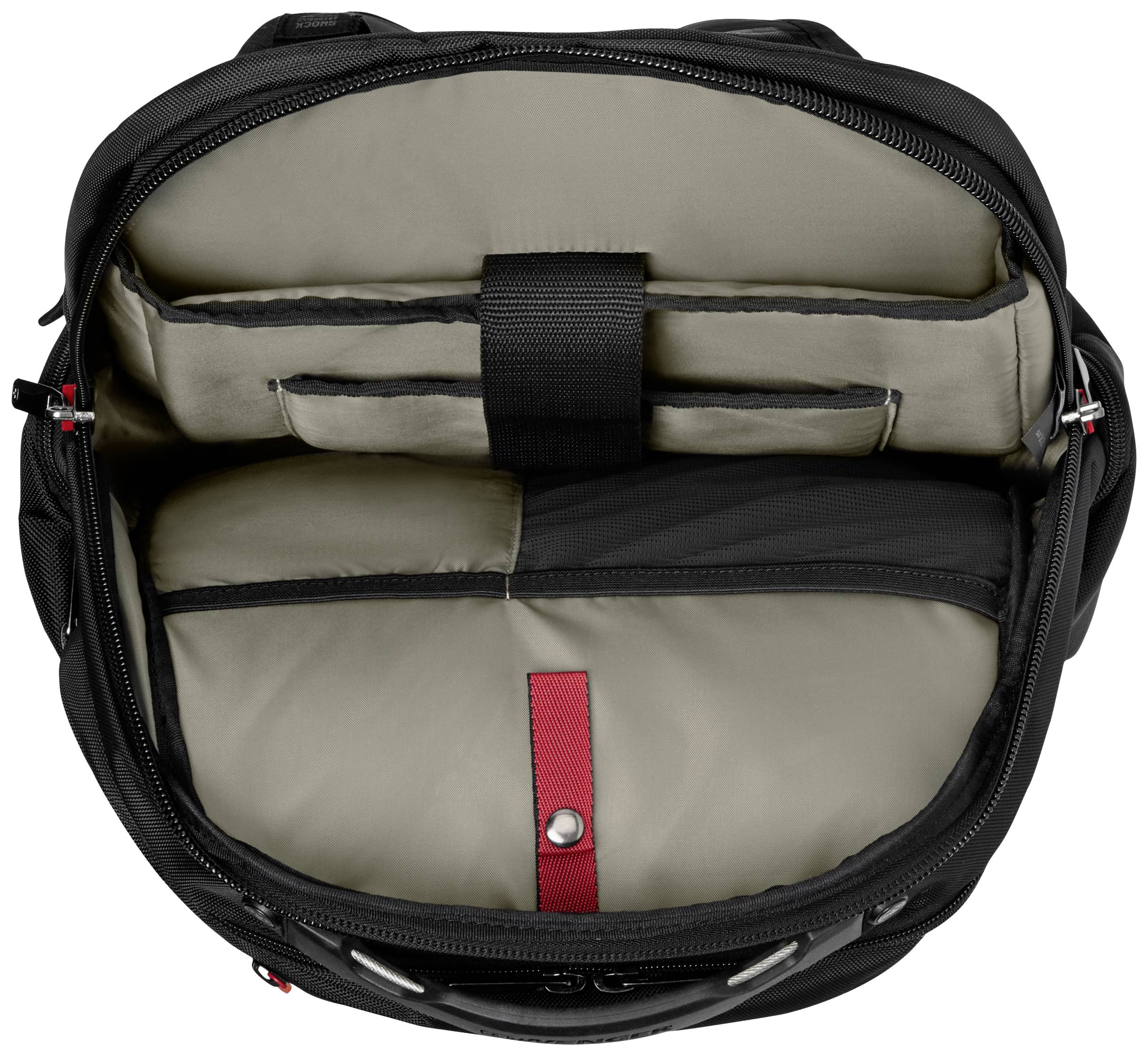 An opened black rucksack reveals a large grey main compartment with padded inserts and a red strap for securing items.
