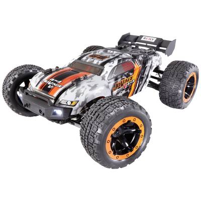 Remote-controlled off-road car with robust, large tyres and a black-and-white bodywork design with red accents.