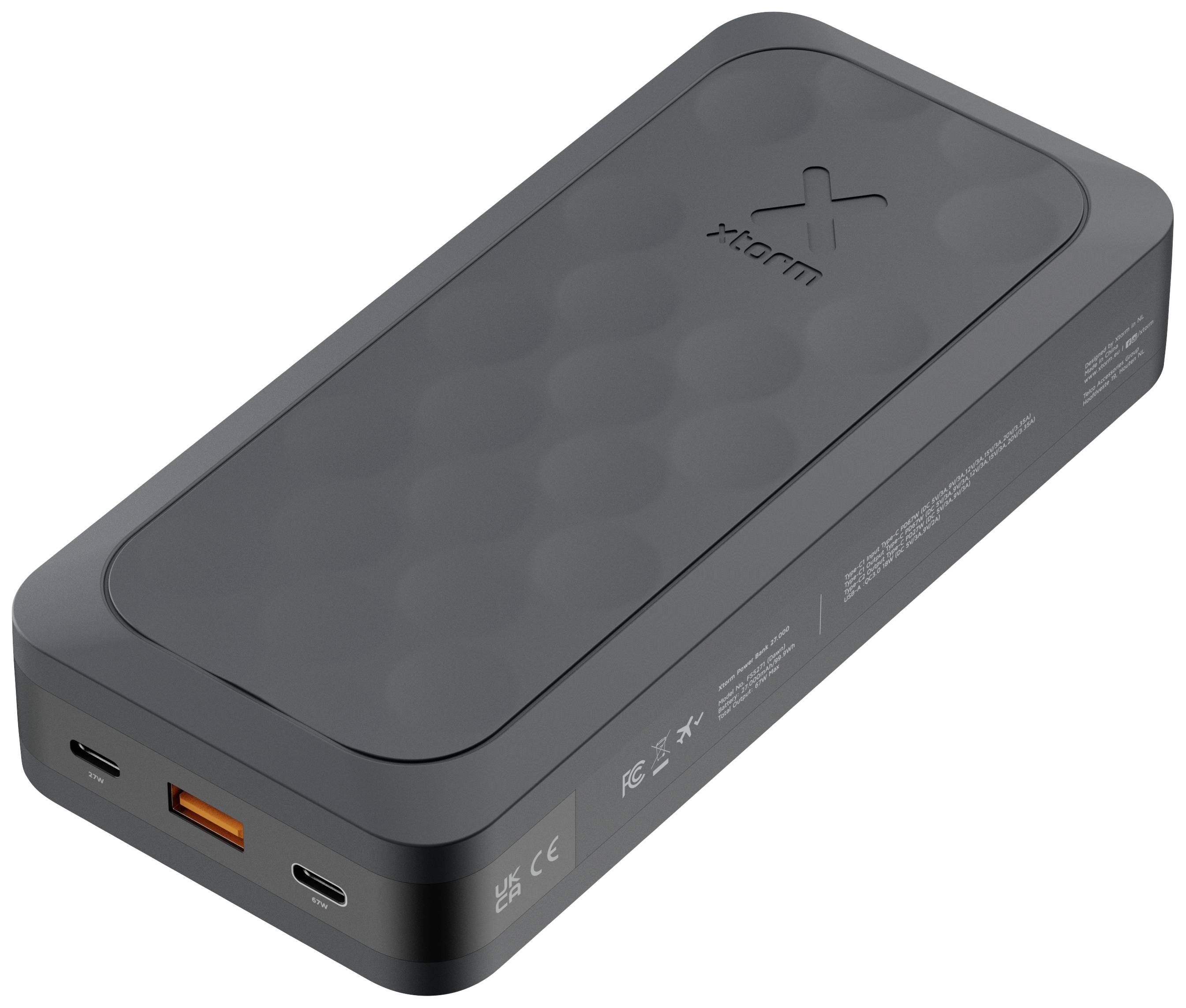 Black, portable power bank with two USB-C ports and one USB-A port, suitable for charging mobile devices whilst travelling.