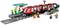 Red toy train on tracks with five figures, a railway station, and a train conductor. The scene depicts an everyday situation at a railway station.
