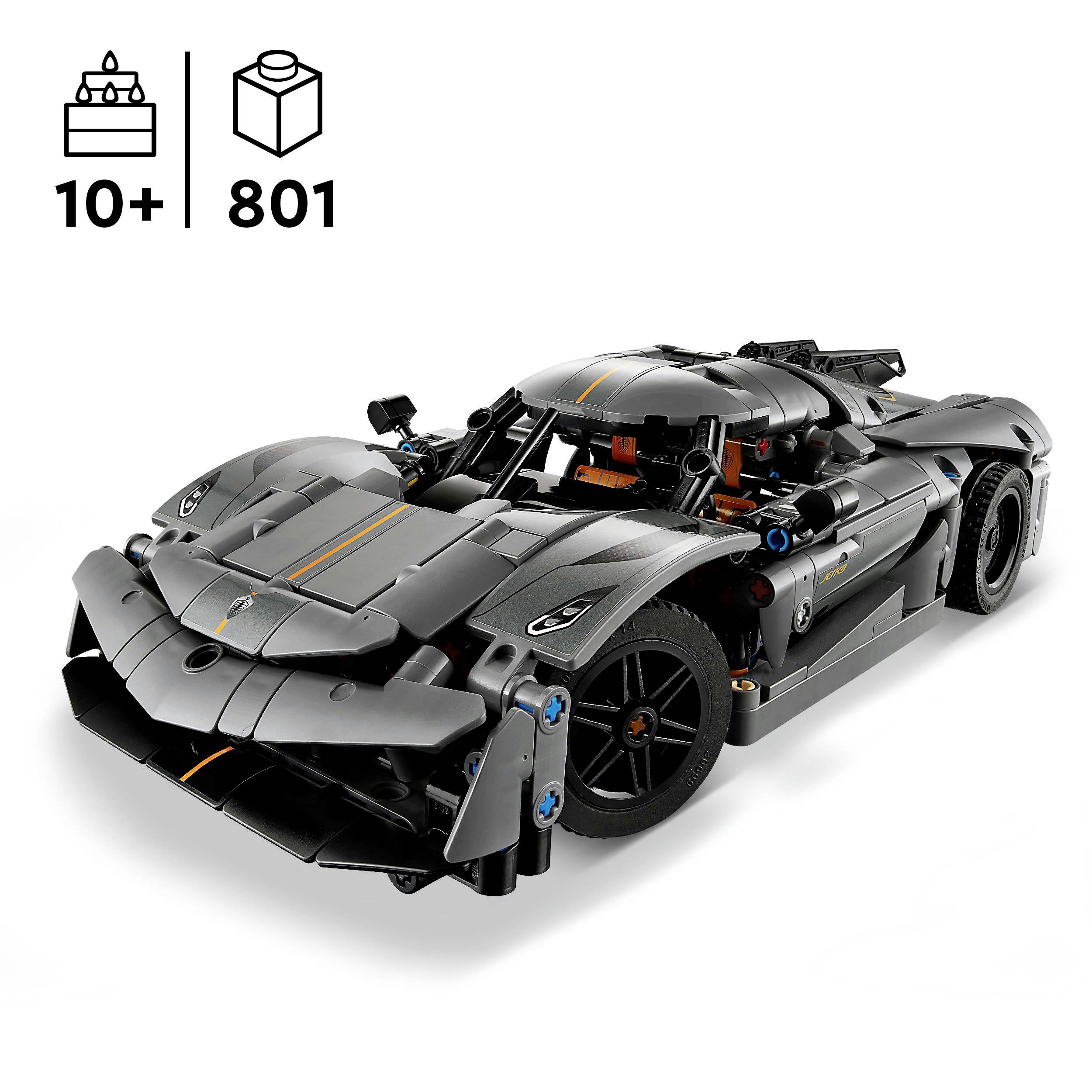 A black toy car made from building blocks, recommended for ages 10 and up, with 801 pieces. The design resembles a sports car.
