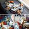 Lego model of a NASA Apollo 17 rover with orange wheels and details; displayed on a table.