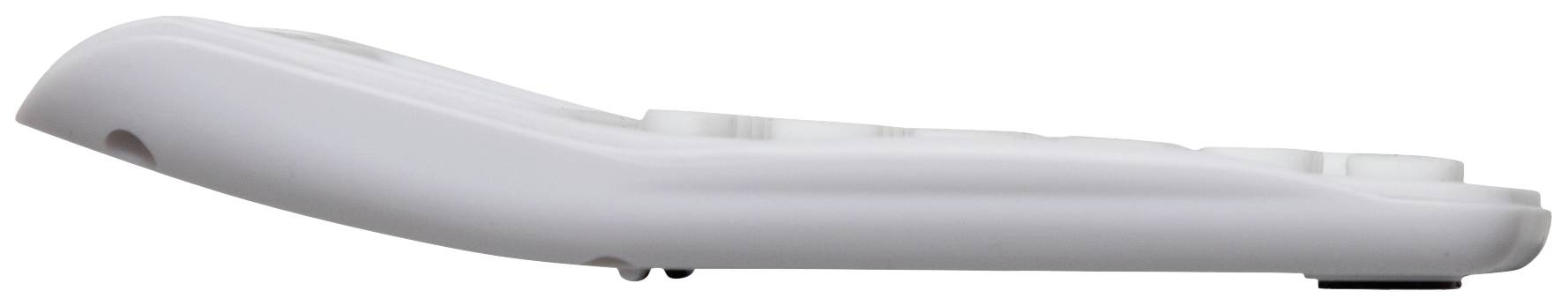 A white remote control in side profile, lying on a flat surface.