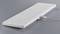 White, flat keyboard with cable on grey surface. The keys are printed with black symbols and letters.