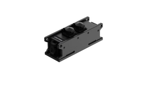 A black, rectangular mechanical component with two connectors. It appears to be a technical device part.