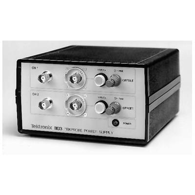 An old Tektronix 1103 power supply system with two channels, controls, and connectors, depicted in black and white.