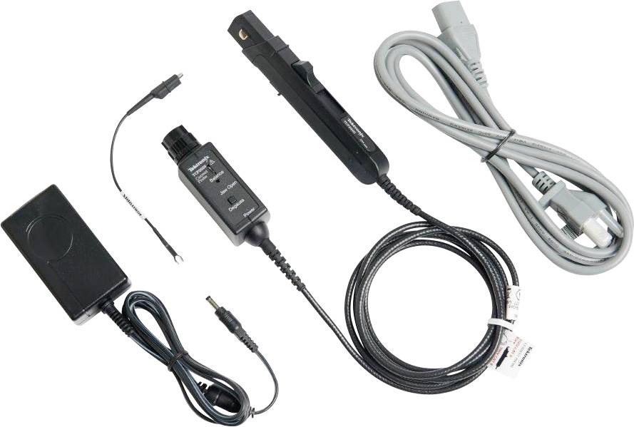 'Electrical test probe with various connectors and cables laid out on a white surface.'