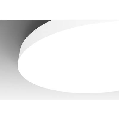 A bright, round lamp illuminates from the ceiling, its edge standing out distinctly against the grey background.
