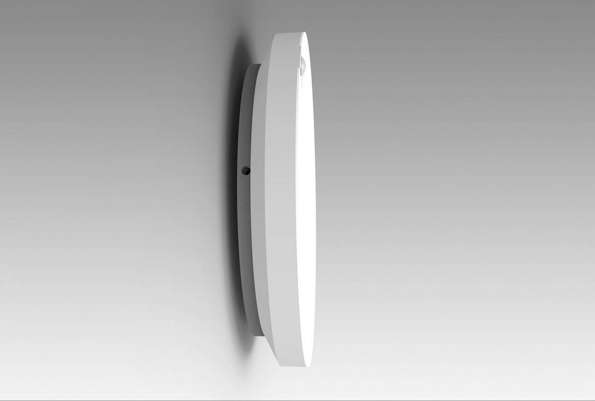 A white, round wall clock with a minimalist design, shown from the side, against a grey background.