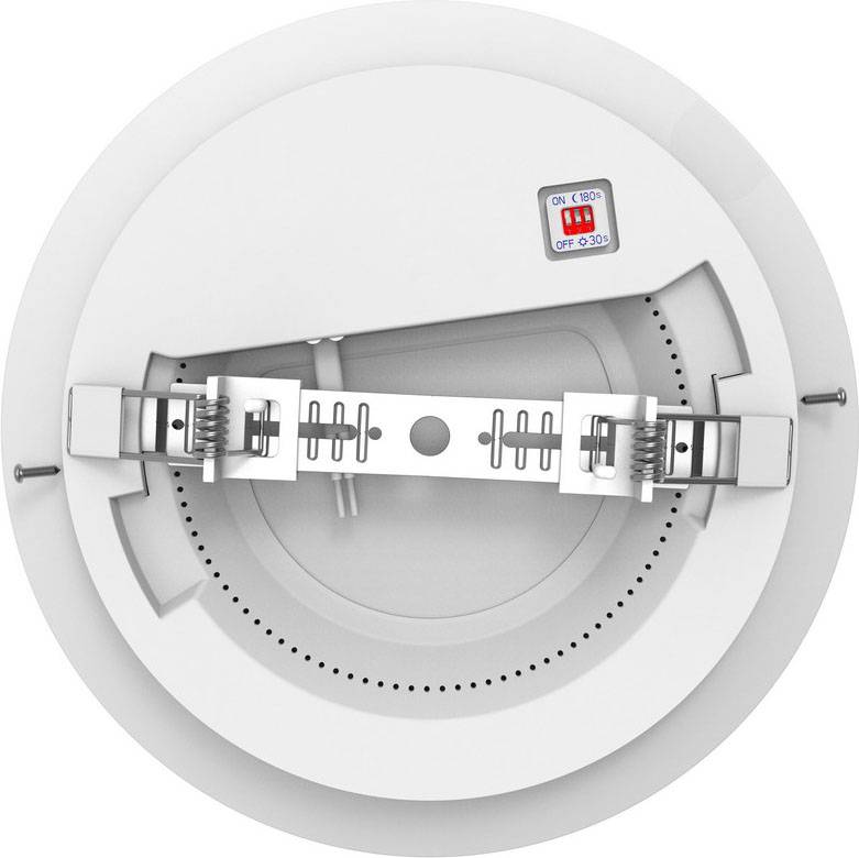 Round ceiling speaker in white, with switch positions 'ON', 'OFF', and '6' on blue label. Screw mounting visible.