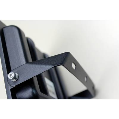 Metal mounting bracket on a device, secured with a screw; focus on mounting bracket detail and structure.