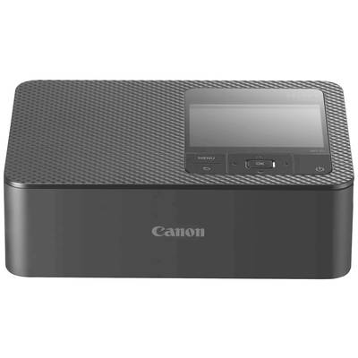 Portable Canon photo printer with digital display and control buttons on the front panel.