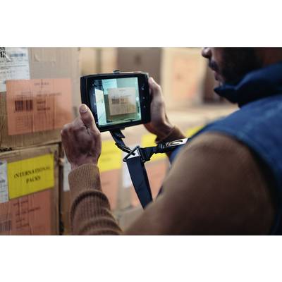 A person is scanning the barcodes on packages in a warehouse using a handheld device. The packages are marked with yellow labels.
