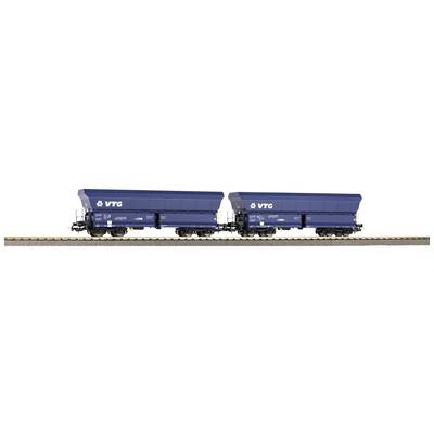 Two blue freight wagons on a track, each with the inscription 'VTG'. The wagons are identical and positioned in a row.