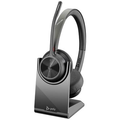 A wireless headset with a microphone on a charging station. The headset has a modern design and is from the brand 'Poly'.