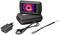 A portable thermal imaging camera with a colour screen displays a thermal image. Accessories: charging cable, mains adapter, carry case.